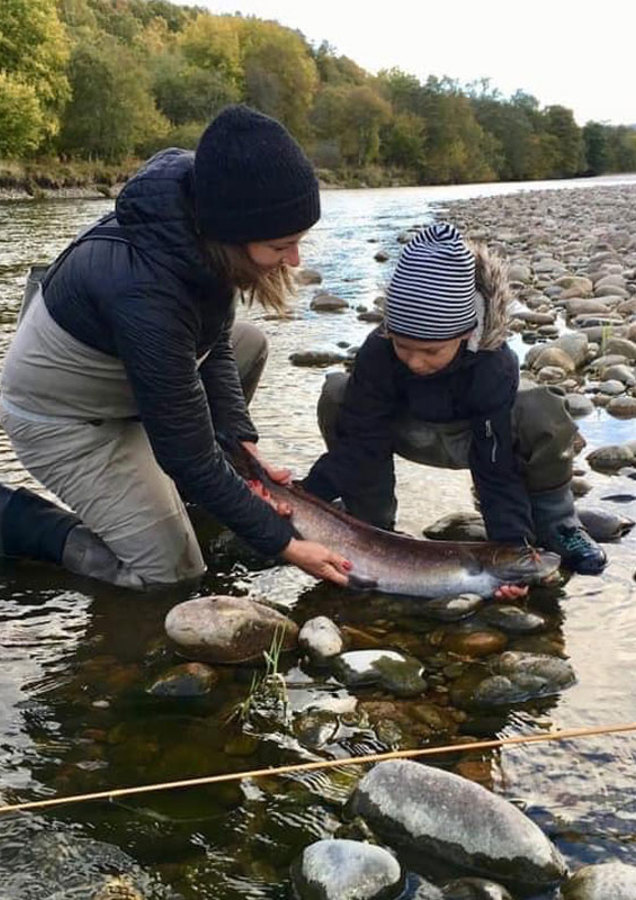 Mum And Son Fishing
